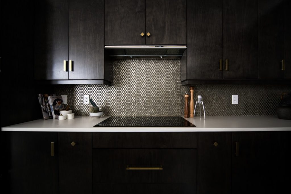 A dark kitchen, a popular 2019 design trend. 