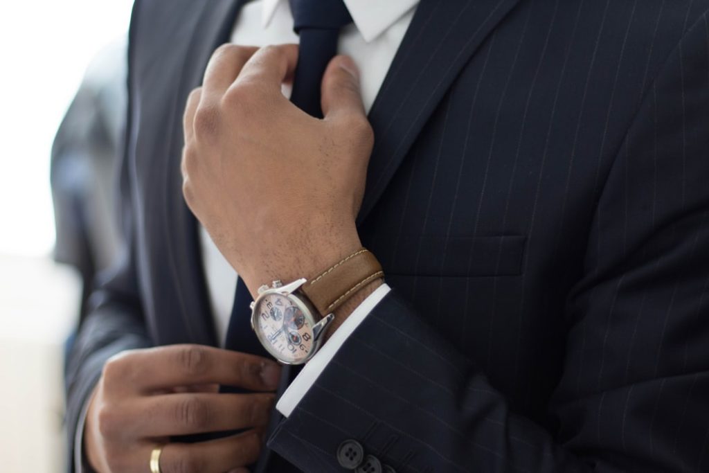 A man wearing a suit for a New Year's Eve event.